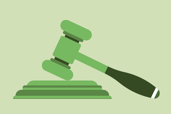 En illustrerad grön ordförandeklubba