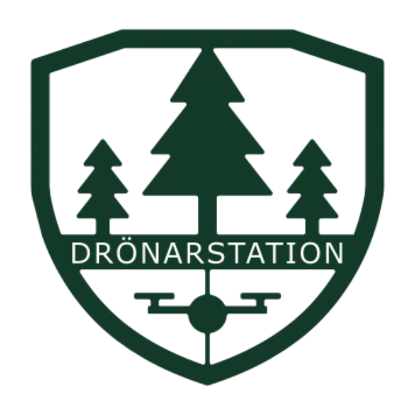 Dark green shield-shaped logo showing three pine trees above a stylized drone icon, with the word “DRONARSTATION” across the middle, suggesting a drone station or forestry-themed drone service identity.